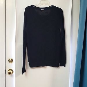 Fossil woman black sweater size M